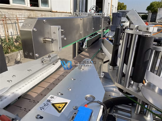 Etichettatrice per etichette adesive con etichettatrice lato superiore per bottiglie rotonde piatte completamente automatiche